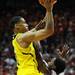 Michigan sophomore Trey Burke shoots the ball over Indiana freshman Kevin Ferrell during the second half at Assembly Hall on Saturday, Feb. 2 in Bloomington, Ind. Melanie Maxwell I AnnArbor.com
